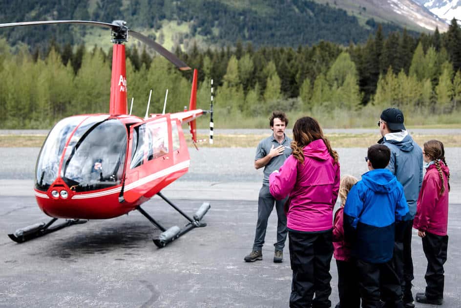 Family with helicopter in Girdwood Alaska