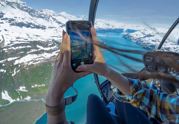 Taking photos from Helicopter Tour Alaska